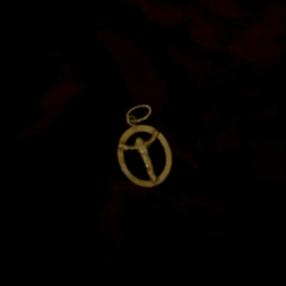 14kt gold. Crucifix pendant. Ideal for necklace or bracelet charm.